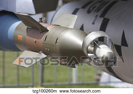 Picture - A GBU-24 laser-guided bomb on a F-16 aircraft.. Fotosearch