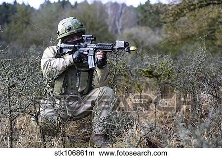 A Georgian soldier provides security in Hohenfels, Germany. View Large Photo Image Picture - A Georgian soldier provides security in Hohenfels, Germany.. Fotosearch