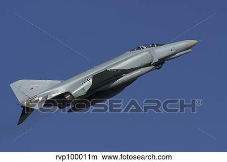 A German F-4F Phantom in flight, Florennes, Belgium. View Large Photo Image Picture - A German F-4F Phantom in flight, Florennes, Belgium.. Fotosearch