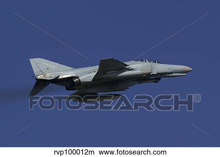 A German F-4F Phantom in flight, Florennes, Belgium. View Large Photo Image Picture - A German F-4F Phantom in flight, Florennes, Belgium.. Fotosearch