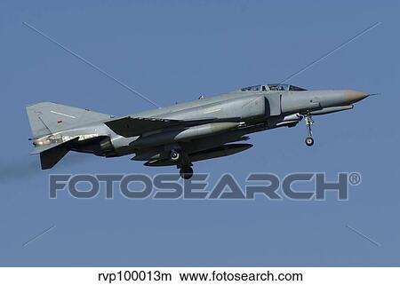 A German F-4F Phantom in flight, Florennes, Belgium. View Large Photo Image Picture - A German F-4F Phantom in flight, Florennes, Belgium.. Fotosearch