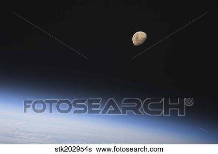 A gibbous moon visible above Earth's atmosphere. View Large Photo Image Stock Photograph - A gibbous moon visible above Earth's atmosphere.. Fotosearch