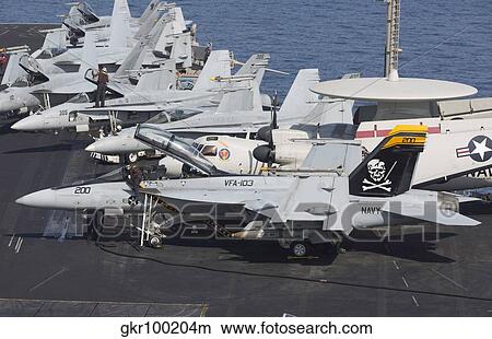 A group of F/A-18F Super Hornets on the flight deck of USS Dwight D. Eisenhower. View Large Photo Image Picture - A group of F/A-18F Super Hornets on the flight deck of USS Dwight D. Eisenhower.. Fotosearch