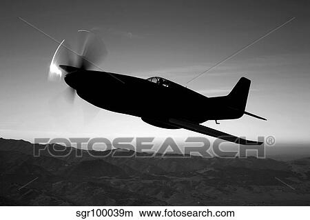 A Grumman F6F Hellcat fighter plane in flight. View Large Photo Image Picture - A Grumman F6F Hellcat fighter plane in flight.. Fotosearch