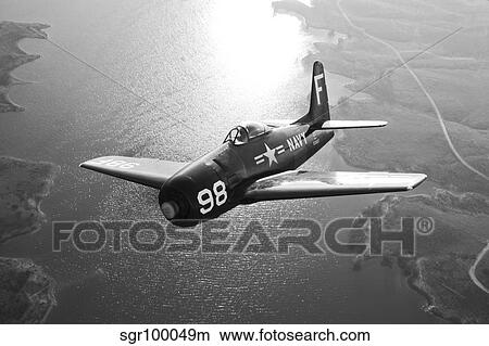 A Grumman F8F Bearcat in flight. View Large Photo Image Picture - A Grumman F8F Bearcat in flight.. Fotosearch