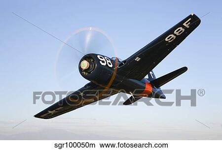 A Grumman F8F Bearcat in flight. View Large Photo Image Picture - A Grumman F8F Bearcat in flight.. Fotosearch