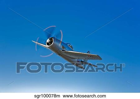 A Grumman F8F Bearcat in flight. View Large Photo Image Picture - A Grumman F8F Bearcat in flight.. Fotosearch