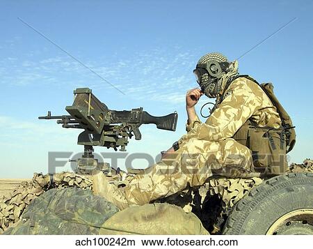 A gunner sits atop a British Army WMIK Land Rover. View Large Photo Image Picture - A gunner sits atop a British Army WMIK Land Rover.. Fotosearch