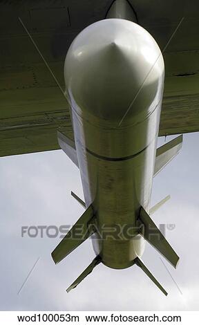 A harpoon missile attached to the wing of a P-3 Orion. View Large Photo Image Picture - A harpoon missile attached to the wing of a P-3 Orion.. Fotosearch
