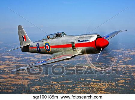 A Hawker Sea Fury T. Mk. 20 Dreadnought aircraft in flight. View Large Photo Image Picture - A Hawker Sea Fury T. Mk. 20 Dreadnought aircraft in flight.. Fotosearch
