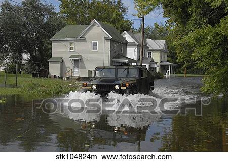 A humvee drives through the floodwaters in Salisbury, Maryland. View Large Photo Image Picture - A humvee drives through the floodwaters in Salisbury, Maryland.. Fotosearch