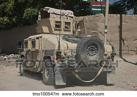 A humvee patrols the streets of Kunduz, Afghanistan. View Large Photo Image Picture - A humvee patrols the streets of Kunduz, Afghanistan.. Fotosearch