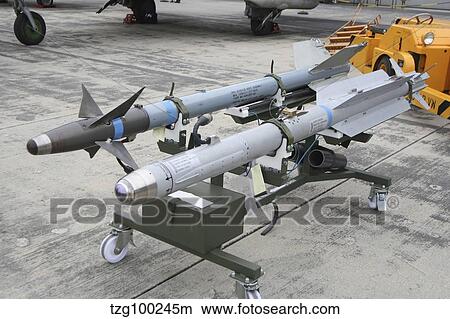 A IRIS-T air-to-air missile compared to an AIM-9 Sidewinder. View Large Photo Image Picture - A IRIS-T air-to-air missile compared to an AIM-9 Sidewinder.. Fotosearch