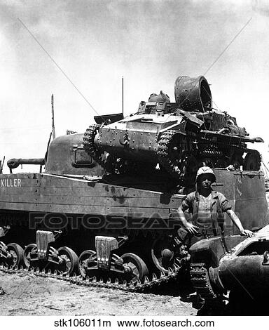 Picture - A Japanese light tank sits atop the medium tank Killer.. Fotosearch