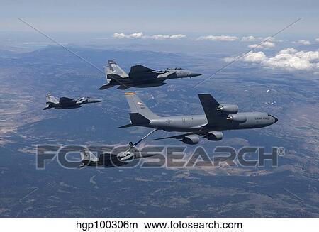 A KC-135R Stratotanker refuels three F-15 Eagles. View Large Photo Image Picture - A KC-135R Stratotanker refuels three F-15 Eagles.. Fotosearch