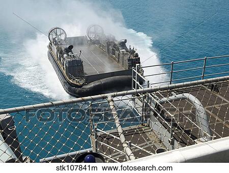 A landing craft air cushion approaches the well deck of USS Bonhomme Richard. View Large Photo Image Picture - A landing craft air cushion approaches the well deck of USS Bonhomme Richard.. Fotosearch