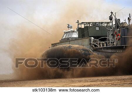 A Landing Craft Air Cushion coming ashore on a beach during an exercise near Camp Lemonier, Djibouti. View Large Photo Image Picture - A Landing Craft Air Cushion coming ashore on a beach during an exercise near Camp Lemonier, Djibouti. . Fotosearch