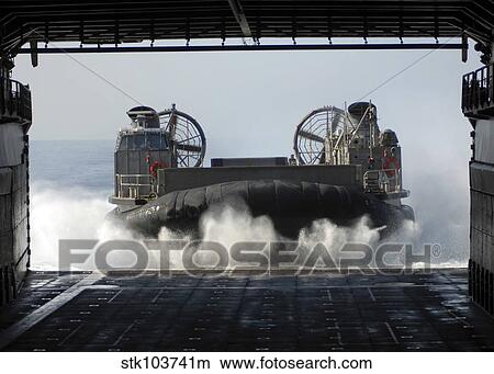 A Landing Craft Air Cushion enters the well deck USS Harpers Ferry. View Large Photo Image Picture - A Landing Craft Air Cushion enters the well deck USS Harpers Ferry.. Fotosearch