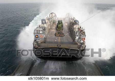 A landing craft air cushion enters the well deck of USS Pearl Harbor. View Large Photo Image Picture - A landing craft air cushion enters the well deck of USS Pearl Harbor.. Fotosearch