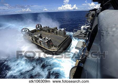 Picture - A landing craft air cushion enters the well deck of USS Bonhomme Richard.. Fotosearch