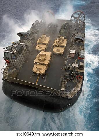 A Landing Craft Air Cushion exits the well deck of USS Bonhomme Richard. View Large Photo Image Picture - A Landing Craft Air Cushion exits the well deck of USS Bonhomme Richard.. Fotosearch