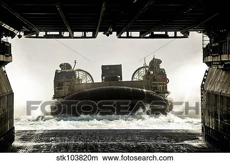 A landing craft air cushion prepares to enter the well deck of the assault ship USS Bonhomme Richard. View Large Photo Image Picture - A landing craft air cushion prepares to enter the well deck of the assault ship USS Bonhomme Richard.. Fotosearch