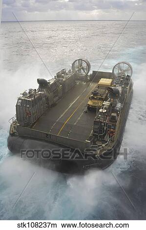 Picture - A Landing Craft Air Cushion propels through the East China Sea.. Fotosearch
