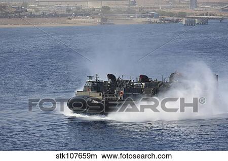 Picture - A landing craft air cushion transits at high speed.. Fotosearch