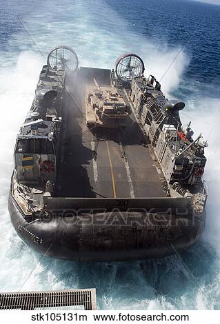 A landing craft air cushion transits the Pacific Ocean at high speed. View Large Photo Image Picture - A landing craft air cushion transits the Pacific Ocean at high speed.. Fotosearch