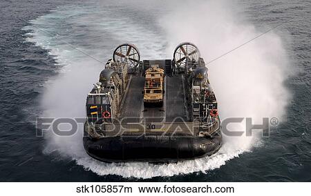 A landing craft air cushion transits the Arabian Gulf. View Large Photo Image Picture - A landing craft air cushion transits the Arabian Gulf.. Fotosearch