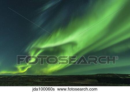 Stock Photograph - A large aurora borealis display in Iceland.. Fotosearch