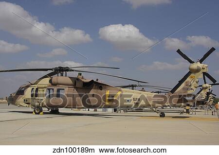 A line of UH-60L Yanshuf helicopters at Hatzerim Air Force Base. View Large Photo Image Picture - A line of UH-60L Yanshuf helicopters at Hatzerim Air Force Base.. Fotosearch