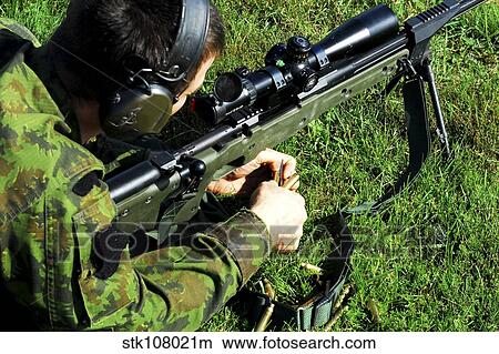 A Lithuanian special operations soldier engages targets with an assault rifle. View Large Photo Image Picture - A Lithuanian special operations soldier engages targets with an assault rifle.. Fotosearch