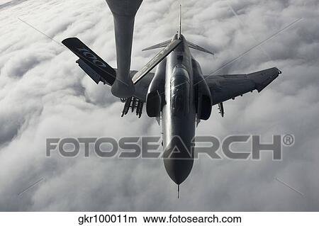 A Luftwaffe F-4F Phantom II approaches a tanker for refueling. View Large Photo Image Picture - A Luftwaffe F-4F Phantom II approaches a tanker for refueling.. Fotosearch
