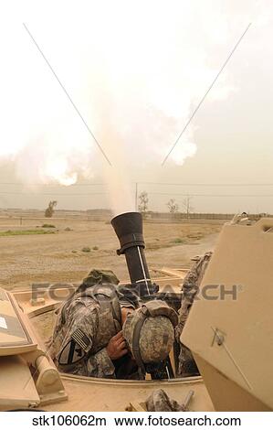 Picture - A M120 Mortar system is fired out of a M113 Armored Personal Carrier.. Fotosearch