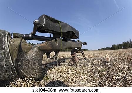 A M40A3 7. 62mm sniper rifle sits ready for use on the shooting range. View Large Photo Image Picture - A M40A3 7. 62mm sniper rifle sits ready for use on the shooting range.. Fotosearch