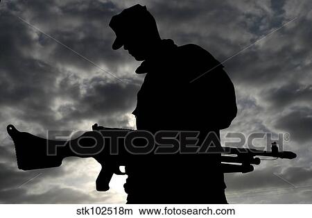 Picture - A Marine attaches an M-240G medium machine gun to the turret of his humvee.. Fotosearch