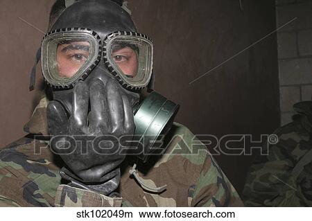 A Marine clears his gas mask. View Large Photo Image Picture - A Marine clears his gas mask.. Fotosearch