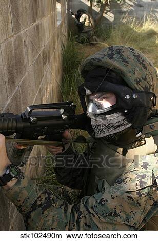 A Marine provides security. View Large Photo Image Picture - A Marine provides security.. Fotosearch