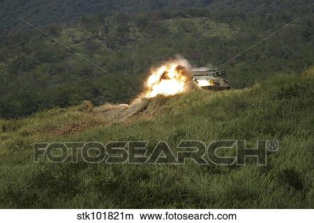 A Marine scores a direct hit while firing an AT-4 at an armored personnel carrier. View Large Photo Image Picture - A Marine scores a direct hit while firing an AT-4 at an armored personnel carrier.. Fotosearch