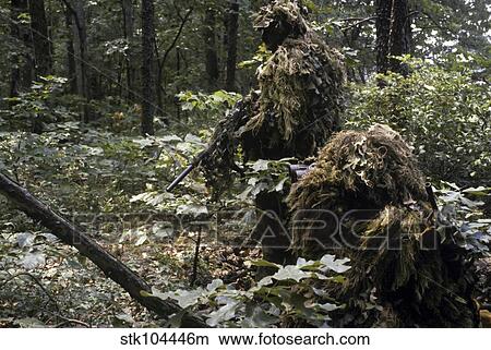 A Marine sniper team wearing camouflage ghillie suits. View Large Photo Image Picture - A Marine sniper team wearing camouflage ghillie suits.. Fotosearch