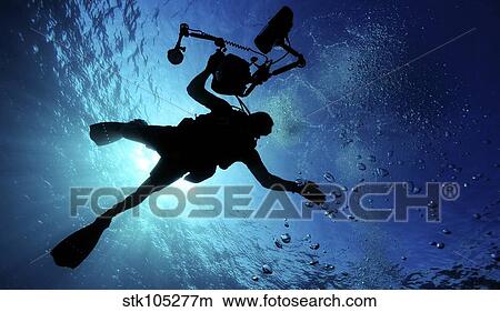 A member of the combat camera underwater photo team. View Large Photo Image Picture - A member of the combat camera underwater photo team.. Fotosearch