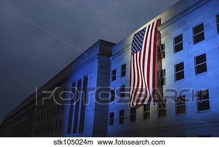 Picture - A memorial flag is illuminated on The Pentagon.. Fotosearch