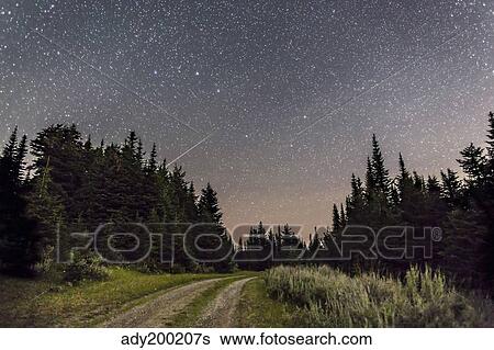 A meteor and the Big Dipper in the clear sky on the summit of Mount Kobau, Canada. View Large Photo Image Stock Photograph - A meteor and the Big Dipper in the clear sky on the summit of Mount Kobau, Canada.. Fotosearch