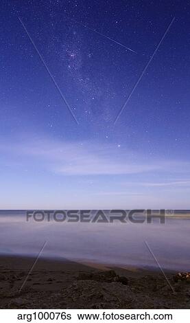 A meteor crossing the Milky Way, Miramar, Argentina. View Large Photo Image Stock Photograph - A meteor crossing the Milky Way, Miramar, Argentina.. Fotosearch