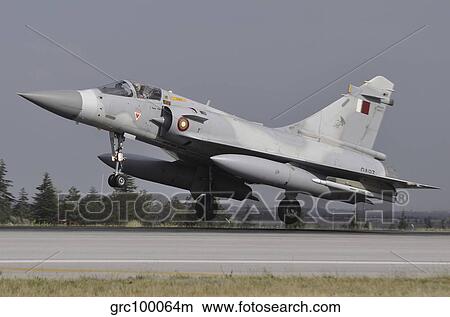 A Mirage 2000-5EDA of the Qatar Emiri Air Force landing at Konya Air Base. View Large Photo Image Picture - A Mirage 2000-5EDA of the Qatar Emiri Air Force landing at Konya Air Base.. Fotosearch