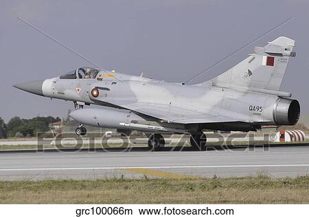 A Mirage 2000-5EDA of the Qatar Emiri Air Force landing at Konya Air Base. View Large Photo Image Picture - A Mirage 2000-5EDA of the Qatar Emiri Air Force landing at Konya Air Base.. Fotosearch