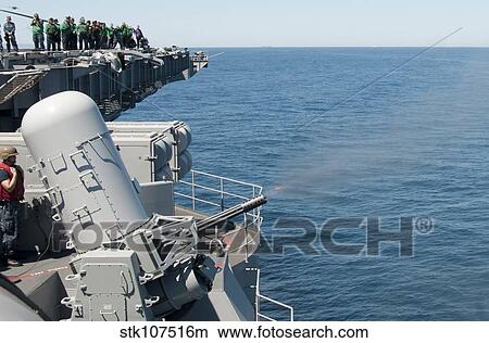 A MK 15 Phalanx close-in weapon system is fired aboard USS Carl Vinson. View Large Photo Image Picture - A MK 15 Phalanx close-in weapon system is fired aboard USS Carl Vinson.. Fotosearch