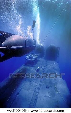 Picture - A MK-8 Mod-0 SEAL Delivery Vehicle rendezvous with the USS Kamehameha.. Fotosearch