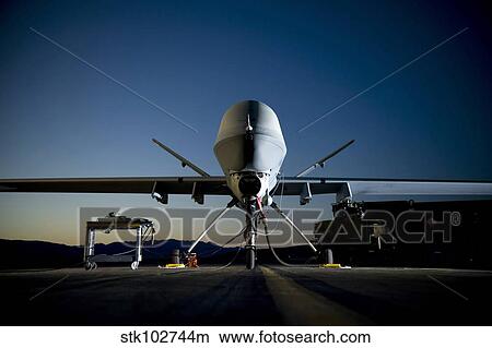 A MQ-9 Reaper being refueled. View Large Photo Image Picture - A MQ-9 Reaper being refueled.. Fotosearch